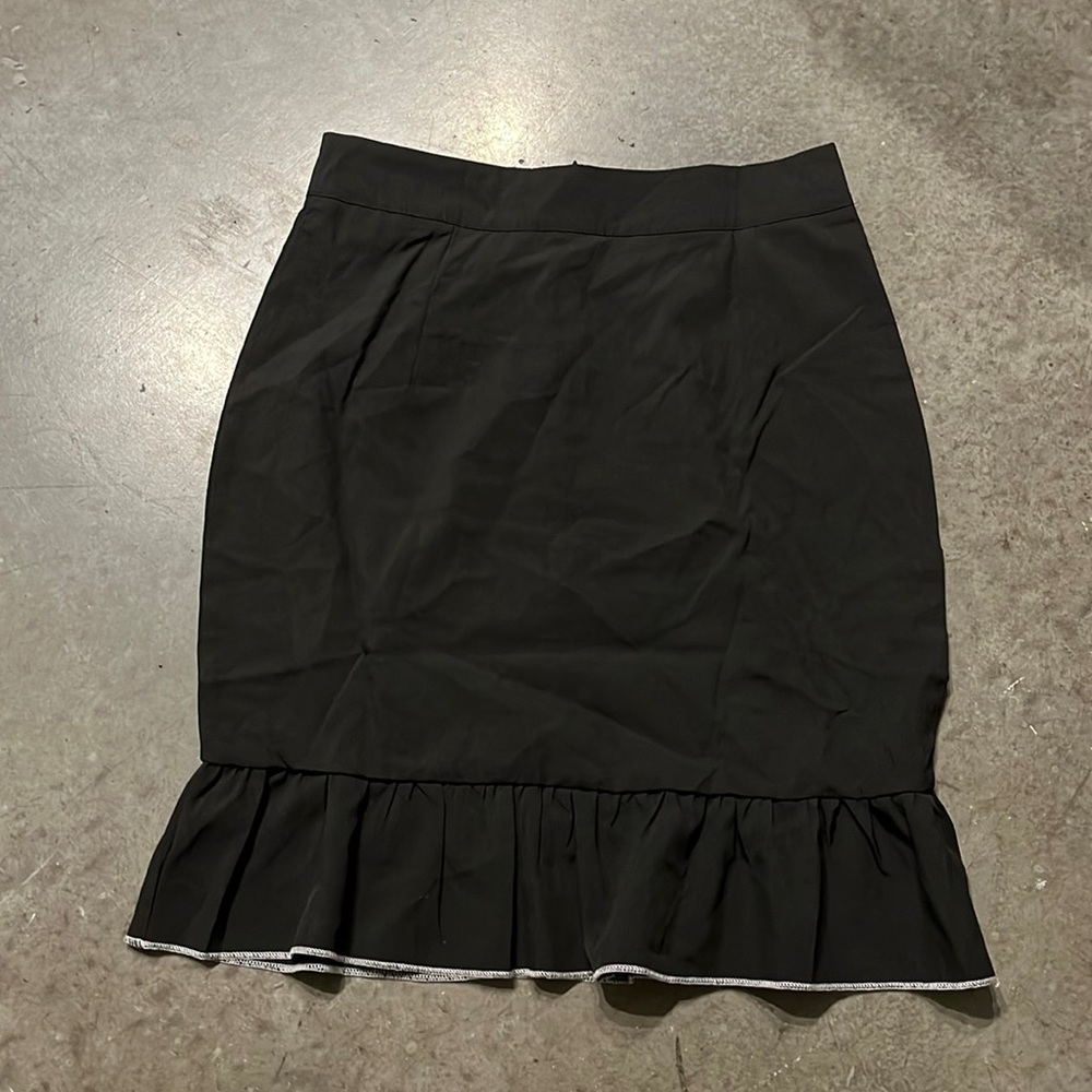 Black pencil skirt with ruffle at end